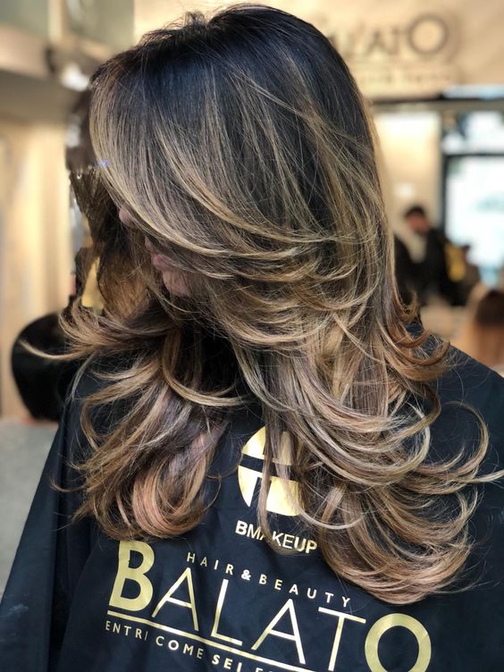 10+ Long Layered Haircuts That Will Sell You on Layers in 2024