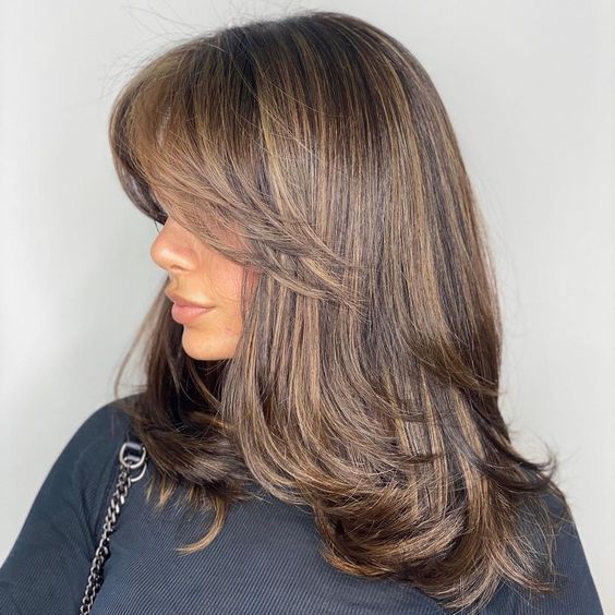 10+ Long Layered Haircuts That Will Sell You on Layers in 2024